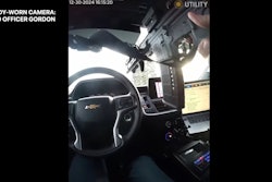 A Lawrence, Indiana, Police officer fires a rifle through his own windshield during a vehicle pursuit where the suspect opened fire on him.