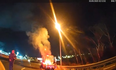 View from Bridgewater (New Jersey) Police Officer Noah Allatt's body camera as he approaches the burning vehicle to rescue the driver.
