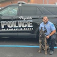 Pagedale, Missouri, Police K-9 Raider with his handler Officer Justin Cull. Raider ran away last week in a storm and was recovered Saturday in good health.