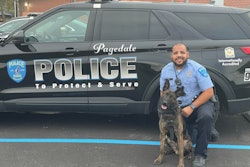 Pagedale, Missouri, Police K-9 Raider with his handler Officer Justin Cull. Raider ran away last week in a storm and was recovered Saturday in good health.