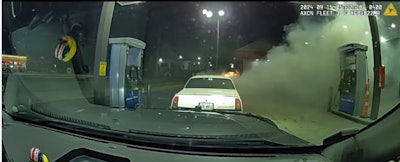 A Stockbridge, Georgia, police officer used his patrol vehicle to push a burning car away from a gas pump.