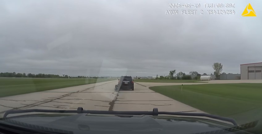 Fond du Lac County (Wisconsin) Sheriff's deputies pursue a suspect on a small airport's runway.