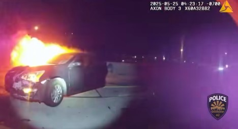 Video release by the Goodyear (Arizona) Police Department shows the perspective of the officer approaching the buring car.