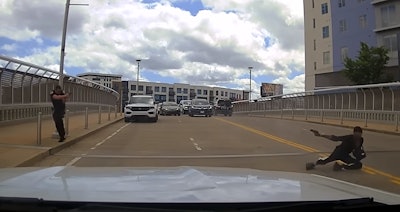 Officer Clayton Lewis of the Metro Nashville Police Department and a suspect exchange fire. Officer Lewis was grazed in the leg. The suspect was killed.