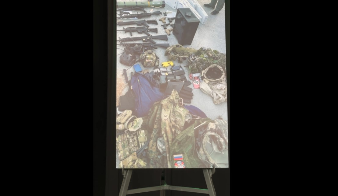 Photo showing some of the gear and weapons found in Damien Allen's residence.