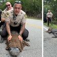 Onslow County, North Carolina, Sheriff's deputy with 'Pepe' the alligator.