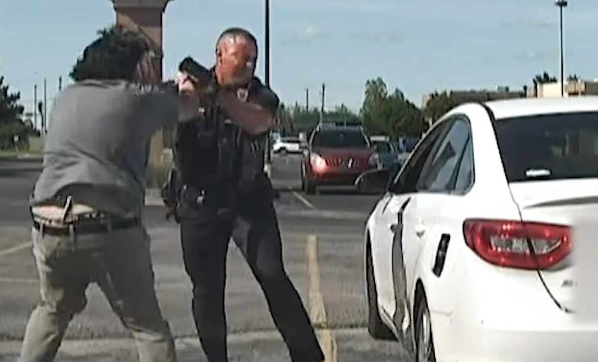 The Edmond Police Department released video showing when its officer was attacked.