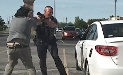 The Edmond Police Department released video showing when its officer was attacked.