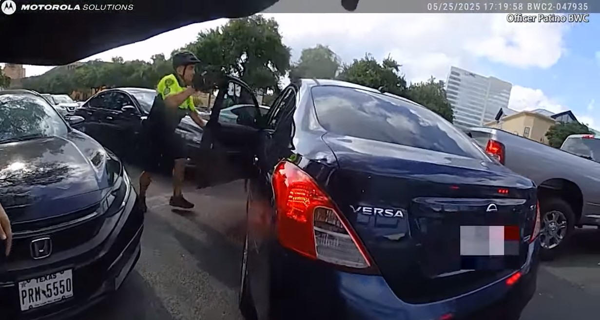 A Houston Police sergeant who was pinned inside a suspect's vehicle shot and critically wounded the suspect.