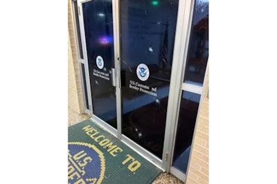 The doors to the U.S. Customs and Border Protection station in McAllen, Texas, shows damage from bullets fired during a July 7, 2025, active shooter attack.