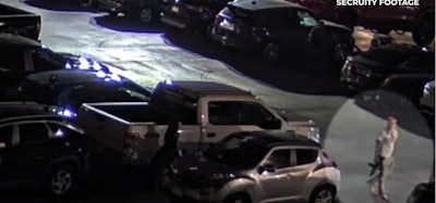 Man with what appears to be a rifle in Colorado Springs nightclub parking lot in early morning of July 5.