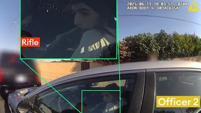 Screen shot from Gilbert Police video shows the suspect holding a rifle moments before he was shot by officers.